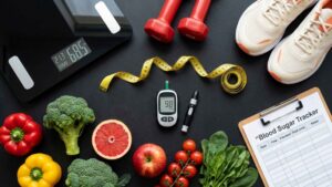 Overhead view of fitness and nutrition items including glucometer, vegetables, fruits, and exercise gear for blood sugar control.